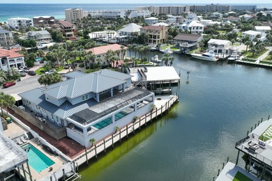 This canal-front home on Holiday Isle sits on a spacious corner