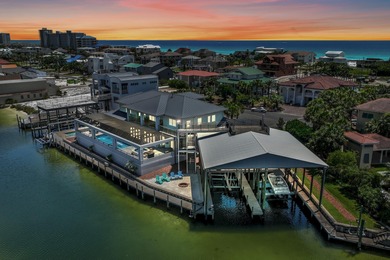 This canal-front home on Holiday Isle sits on a spacious corner