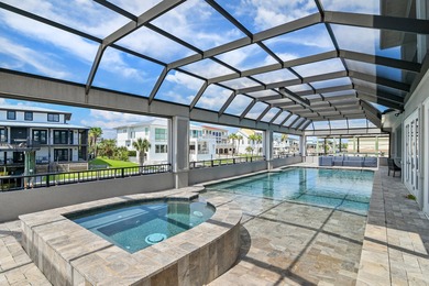 This canal-front home on Holiday Isle sits on a spacious corner