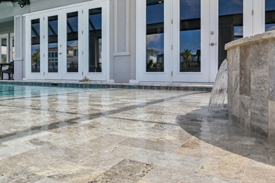 This canal-front home on Holiday Isle sits on a spacious corner