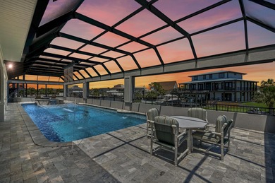 This canal-front home on Holiday Isle sits on a spacious corner