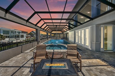 This canal-front home on Holiday Isle sits on a spacious corner