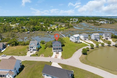 This exceptional new construction in Mariners Pointe blends