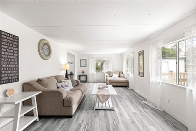 Fully furnished and completely updated, this turnkey home is