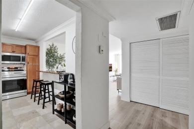 Enjoy the ultimate coastal lifestyle in this spacious 2BD/2BA