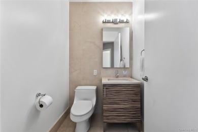 **Breathtaking East River Views from Luxury Astoria High-Rise**

