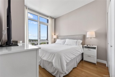 **Breathtaking East River Views from Luxury Astoria High-Rise**

