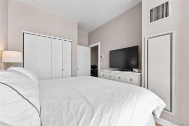 **Breathtaking East River Views from Luxury Astoria High-Rise**

