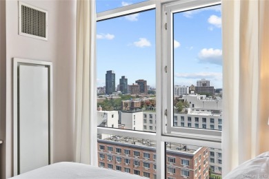 **Breathtaking East River Views from Luxury Astoria High-Rise**

