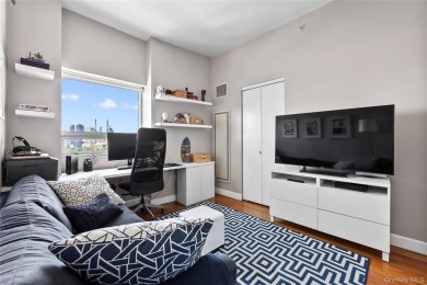 **Breathtaking East River Views from Luxury Astoria High-Rise**

