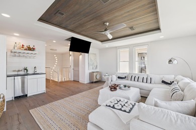 This luxurious home is located south of 30A at Caspian Estates