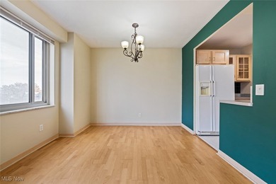 Welcome HOME where the Lake beckons from your window in this