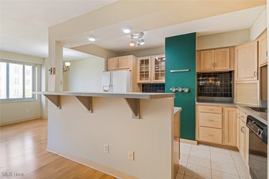 Welcome HOME where the Lake beckons from your window in this