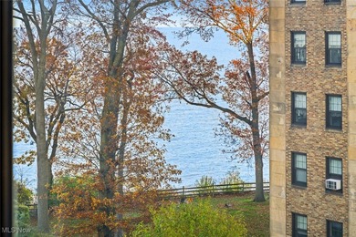 Welcome HOME where the Lake beckons from your window in this