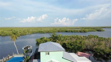 Experience coastal living at its finest with this exceptional