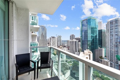 Experience elevated Brickell living in this sun-filled 3-bedroom