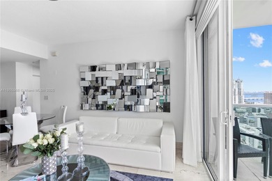 Experience elevated Brickell living in this sun-filled 3-bedroom