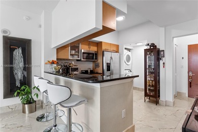 Experience elevated Brickell living in this sun-filled 3-bedroom