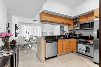 Experience elevated Brickell living in this sun-filled 3-bedroom