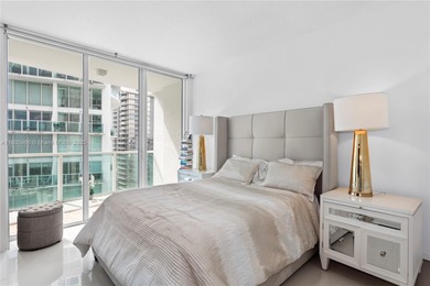 Experience elevated Brickell living in this sun-filled 3-bedroom