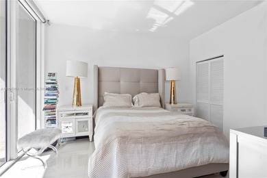 Experience elevated Brickell living in this sun-filled 3-bedroom