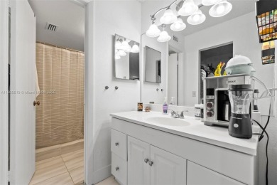 Beautifully renovated ground-floor condo . This modern unit