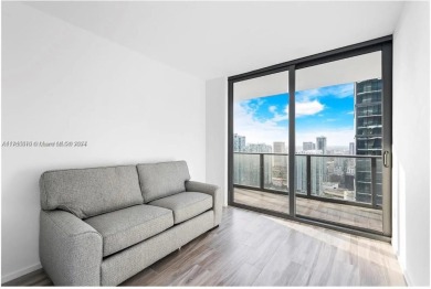Turn-key fully furnished corner unit on the 45th floor, with