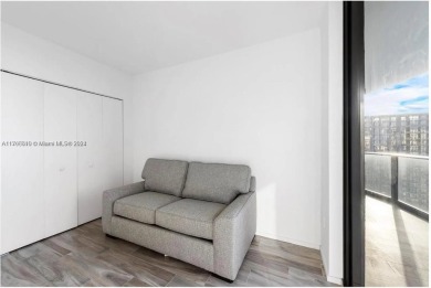 Turn-key fully furnished corner unit on the 45th floor, with