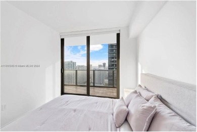 Turn-key fully furnished corner unit on the 45th floor, with