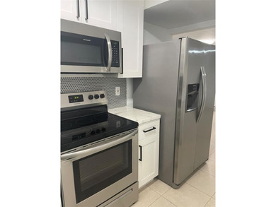 GREAT FIRST FLOOR FULLY RENOVATED THREE-BEDROOMS TWO BATHS