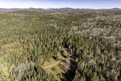 Located contiguous to New York State Lands on 2 sides, this