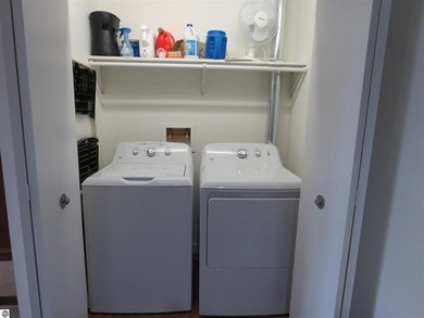 This charming condo offers stunning, expansive views of Lake