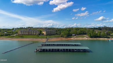 AWESOME CORNER UNIT WITH BOAT SLIP AND BOAT LIFT! Lakefront