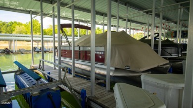 AWESOME CORNER UNIT WITH BOAT SLIP AND BOAT LIFT! Lakefront