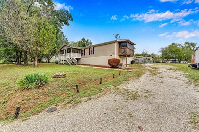 Nestled on nearly 1/2 acre, this beautifully maintained