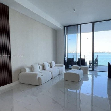 Stunning 1-bedroom plus den fully furnished waterfront residence