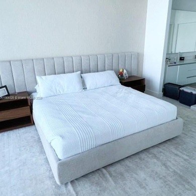 Stunning 1-bedroom plus den fully furnished waterfront residence