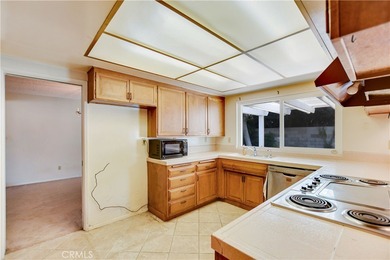 Welcome to this spacious 4-bedroom, 3-bathroom home in the