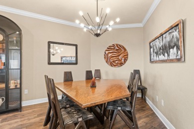 Step into low-maintenance living where the lake is your backdrop