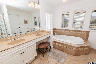 Exceptional oceanfront estate situated on half an acre with over