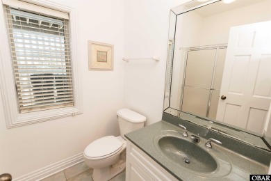 Exceptional oceanfront estate situated on half an acre with over