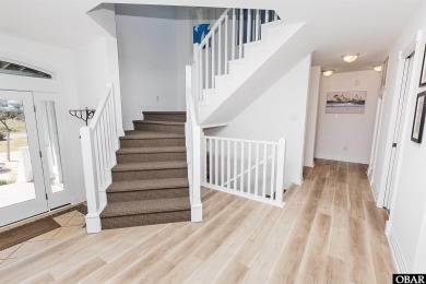 Exceptional oceanfront estate situated on half an acre with over