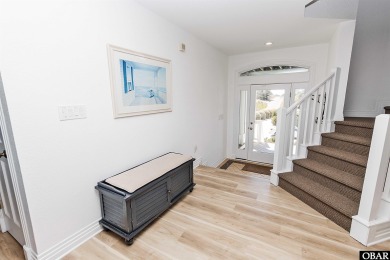 Exceptional oceanfront estate situated on half an acre with over