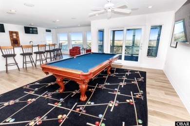 Exceptional oceanfront estate situated on half an acre with over