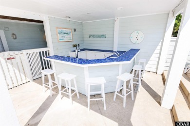 Exceptional oceanfront estate situated on half an acre with over