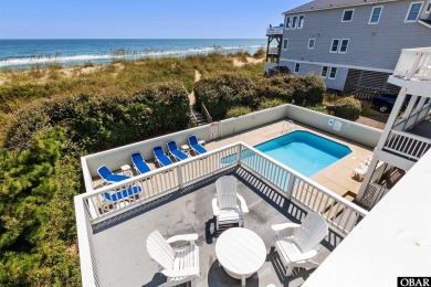 Exceptional oceanfront estate situated on half an acre with over