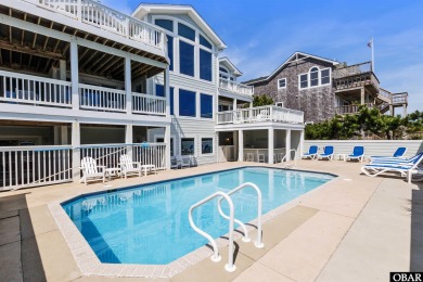 Exceptional oceanfront estate situated on half an acre with over