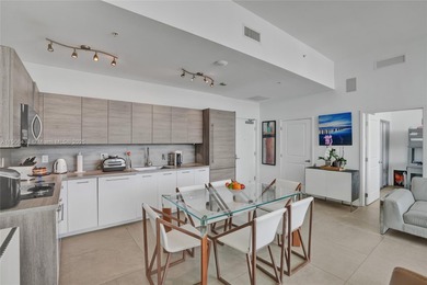 Introducing a spectacular, renovated 2BD+Den/3BA townhome at 400