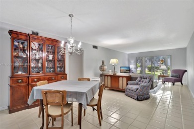 Welcome home to this desirable ground floor condo in one of the