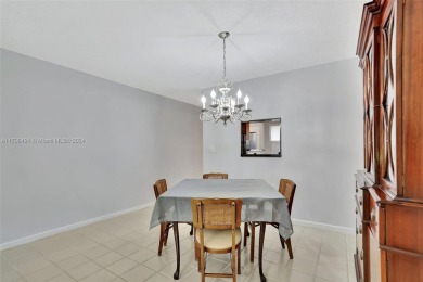 Welcome home to this desirable ground floor condo in one of the
